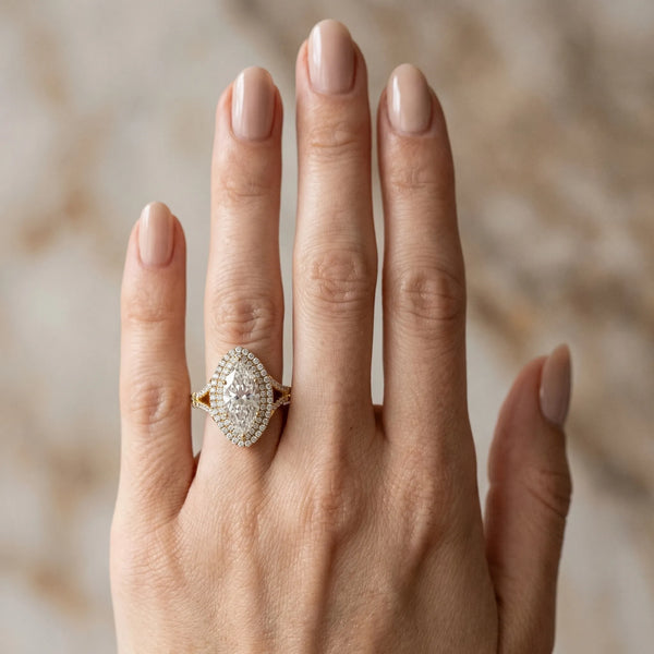 Yellow gold Marquise Cut Double Halo Split Shank Diamond Ring with Prong Setting