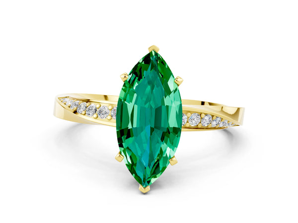 Yellow gold Marquise Cut Emerald Engagement Ring with Side Stone Accents and Four-Prong Setting