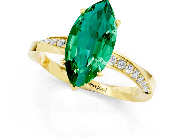 Yellow gold Marquise Cut Emerald Engagement Ring with Side Stone Accents and Four-Prong Setting