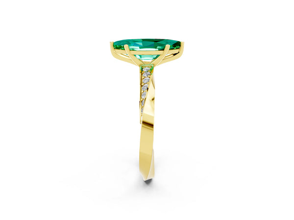 Yellow gold Marquise Cut Emerald Engagement Ring with Side Stone Accents and Four-Prong Setting