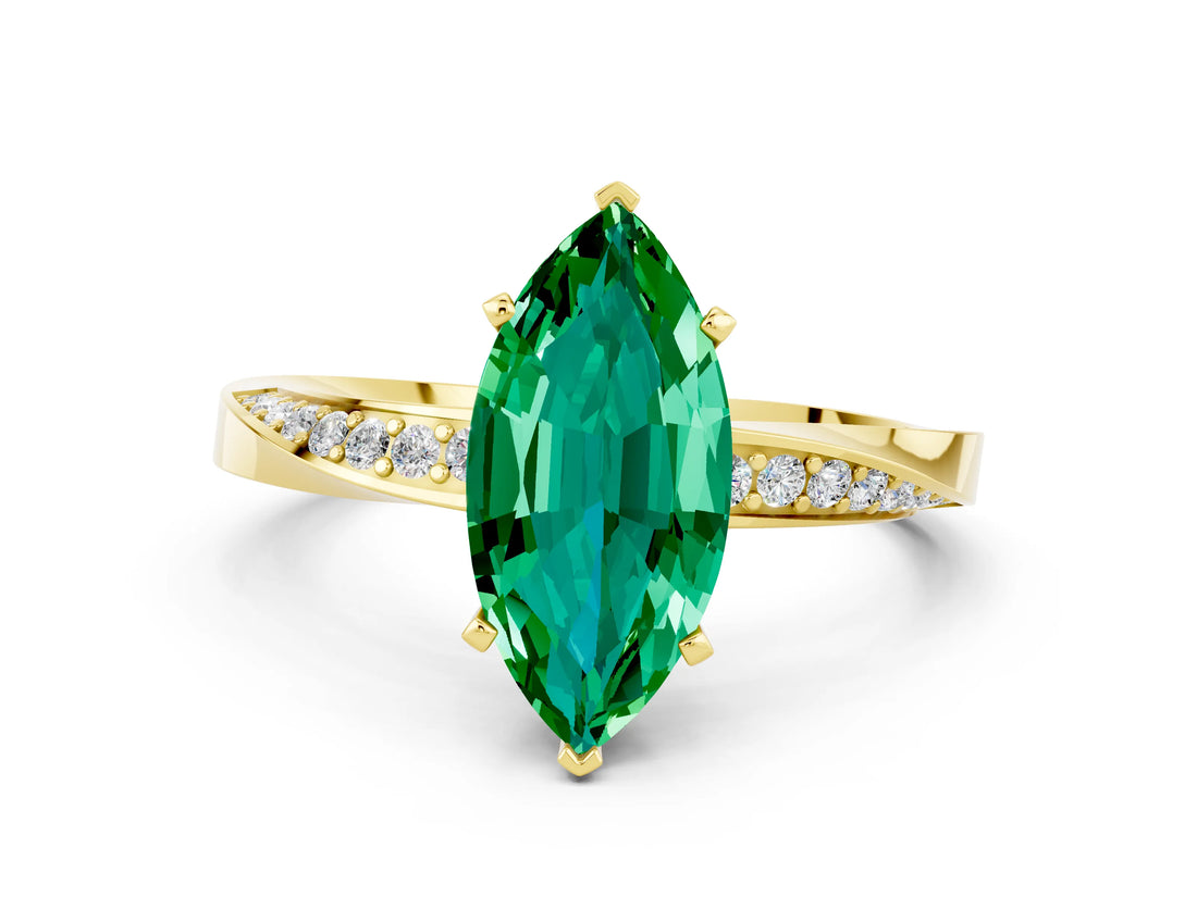 Yellow gold Marquise Cut Emerald Engagement Ring with Side Stone Accents and Four-Prong Setting_60