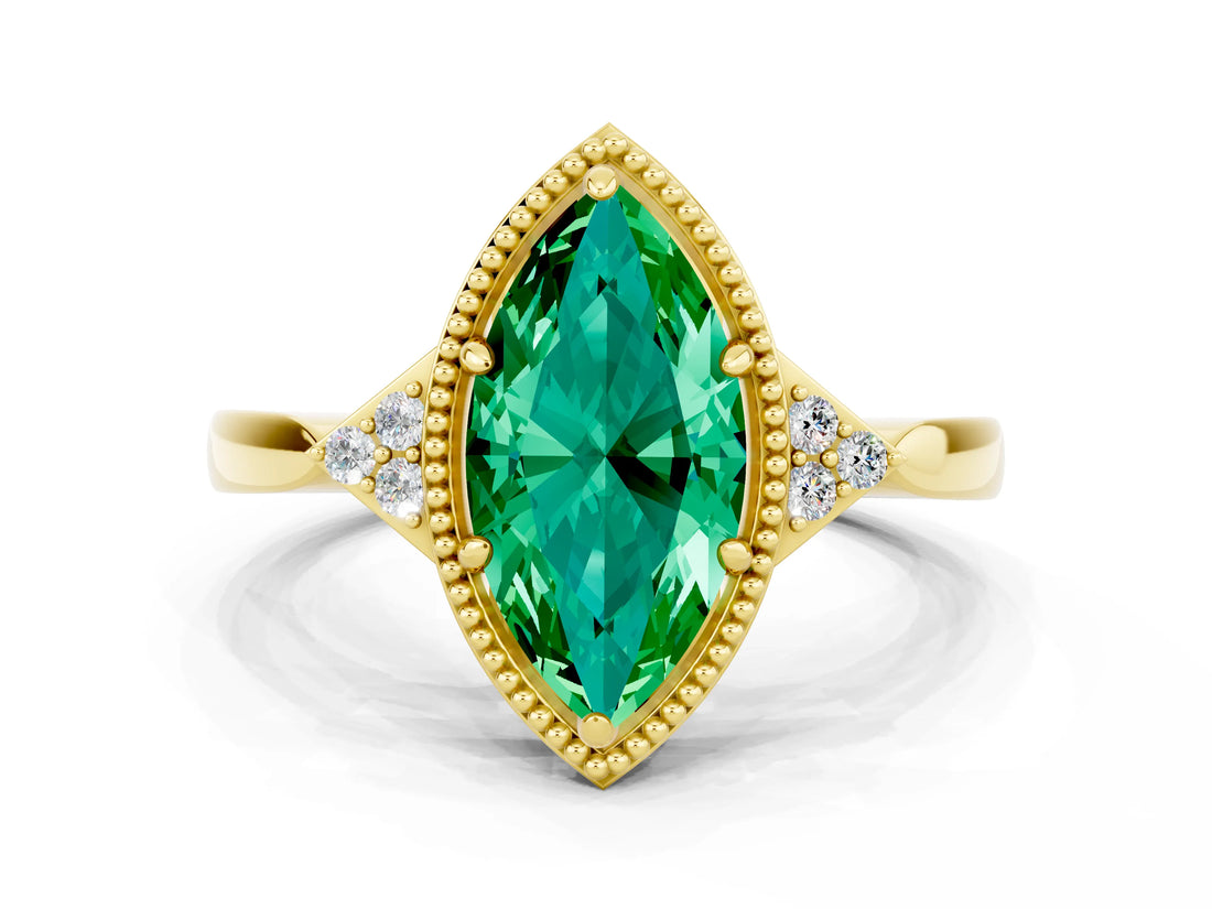 Yellow gold Marquise Cut Emerald Halo Ring with Tapered Band and Four-Prong Setting