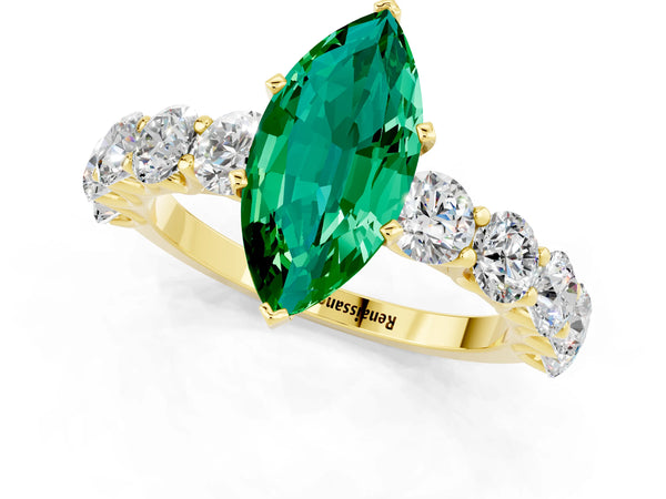 Yellow gold Marquise Cut Emerald Prong Setting with Side Stones on a Pave Band