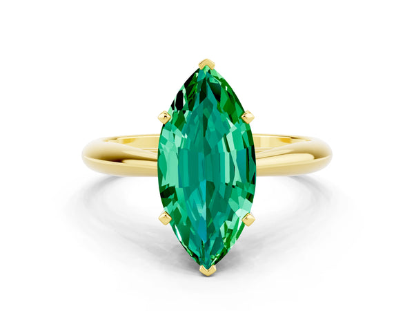 Yellow gold Marquise Cut Emerald Solitaire Engagement Ring with Cathedral Setting and Four-Prong Mount
