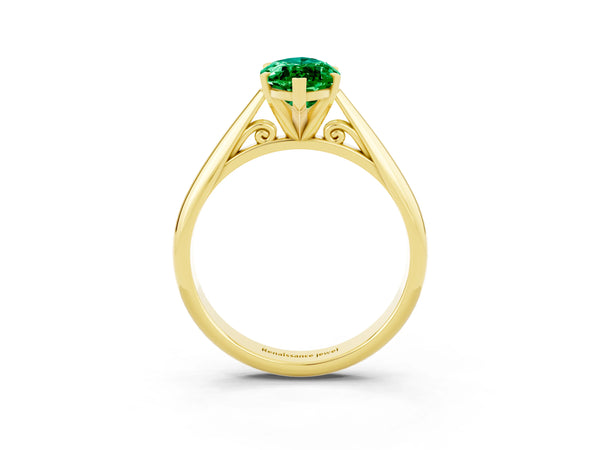 Yellow gold Marquise Cut Emerald Solitaire Engagement Ring with Cathedral Setting and Four-Prong Mount
