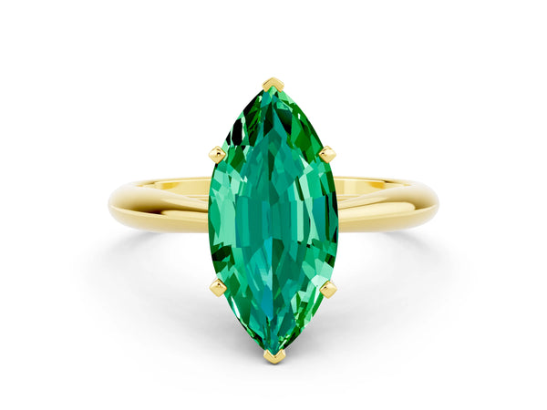 Yellow gold Marquise Cut Emerald Solitaire Engagement Ring with Cathedral Setting and Four-Prong Mount
