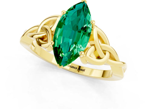 Yellow gold Marquise Cut Emerald Solitaire Engagement Ring with Celtic Knot Band and Four-Prong Setting_1