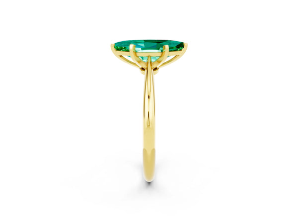 Yellow gold Marquise Cut Emerald Solitaire Engagement Ring with Classic Band and Four-Prong Setting