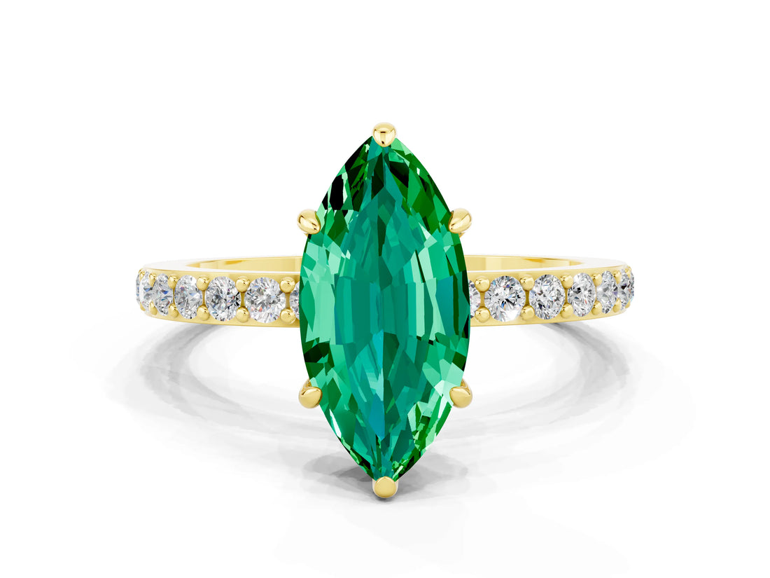 Yellow gold Marquise Cut Emerald Solitaire Engagement Ring with Pavé Band and Four-Prong Setting