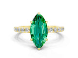 Yellow gold Marquise Cut Emerald Solitaire Engagement Ring with Pavé Band and Four-Prong Setting