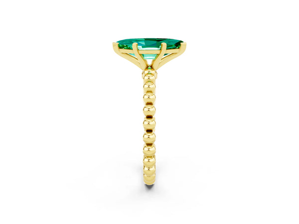 Yellow gold Marquise Cut Emerald Solitaire Ring with Beaded Band and Prong Setting