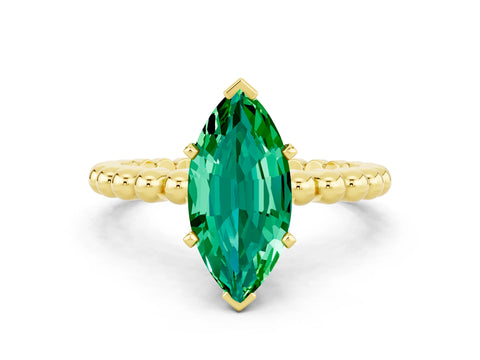 Yellow gold Marquise Cut Emerald Solitaire Ring with Beaded Band and Prong Setting