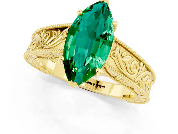 Yellow gold Marquise Cut Emerald Solitaire Ring with Engraved Band and Four-Prong Setting