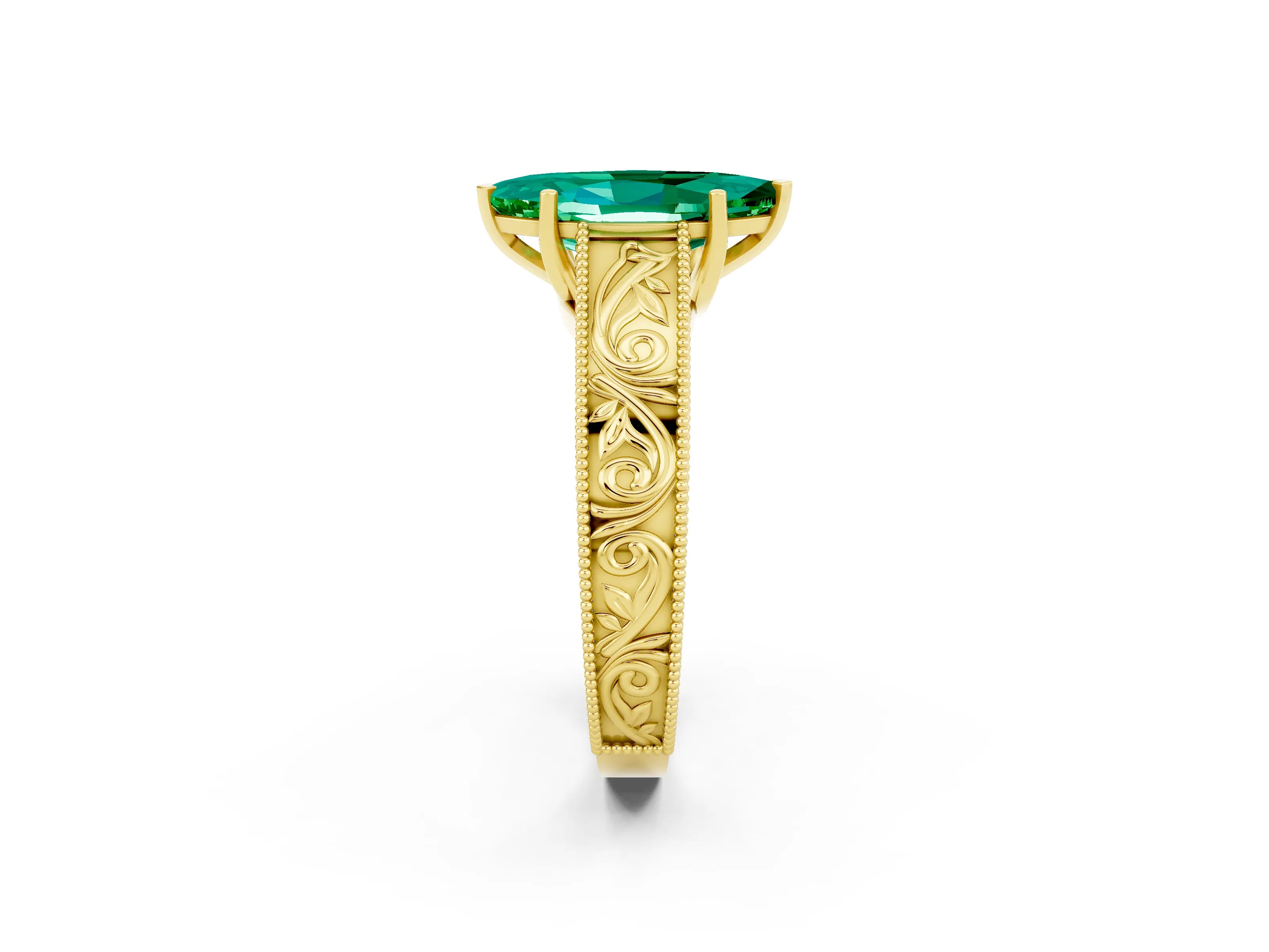 Yellow gold Marquise Cut Emerald Solitaire Ring with Engraved Band and Four-Prong Setting_2