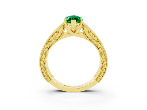 Yellow gold Marquise Cut Emerald Solitaire Ring with Engraved Band and Four-Prong Setting_3