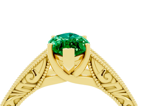 Yellow gold Marquise Cut Emerald Solitaire Ring with Engraved Band and Four-Prong Setting_4
