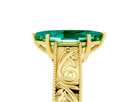 Yellow gold Marquise Cut Emerald Solitaire Ring with Engraved Band and Four-Prong Setting_5