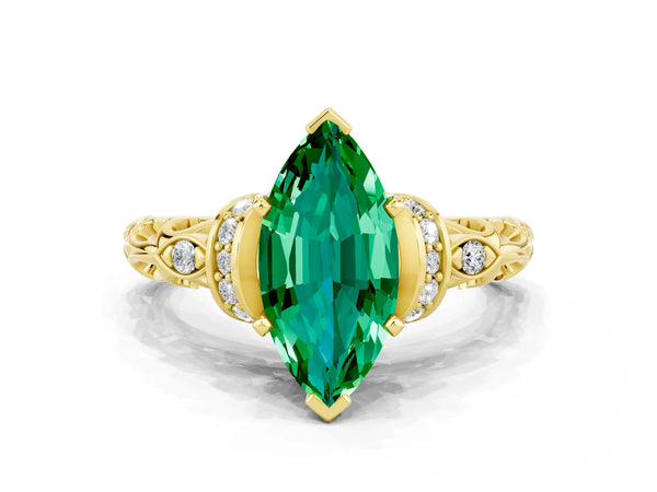 Yellow gold Marquise Cut Emerald Solitaire Ring with Filigree Band and Four-Prong Setting