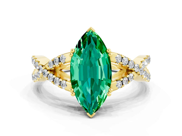 Yellow gold Marquise Cut Emerald Solitaire Ring with Four-Prong Setting and Twisted Pavé Band