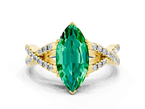 Yellow gold Marquise Cut Emerald Solitaire Ring with Four-Prong Setting and Twisted Pavé Band