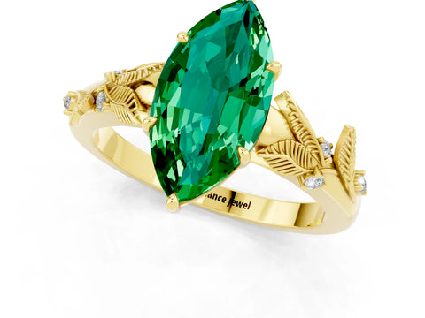 Yellow gold Marquise Cut Emerald Solitaire Ring with Leaf Motif Band and Four-Prong Setting_1