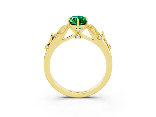 Yellow gold Marquise Cut Emerald Solitaire Ring with Leaf Motif Band and Four-Prong Setting