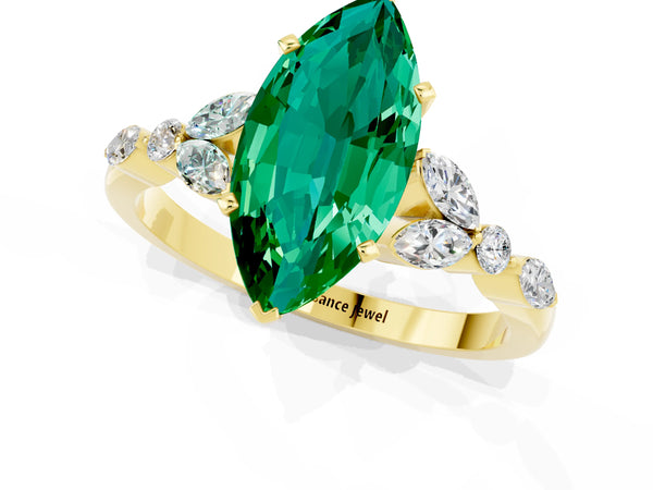 Yellow gold Marquise Cut Emerald Solitaire Ring with Side Stones and Four-Prong Setting