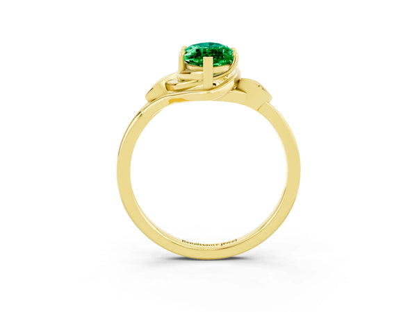 Yellow gold Marquise Cut Emerald Solitaire Ring with Twist Band and Four-Prong Setting