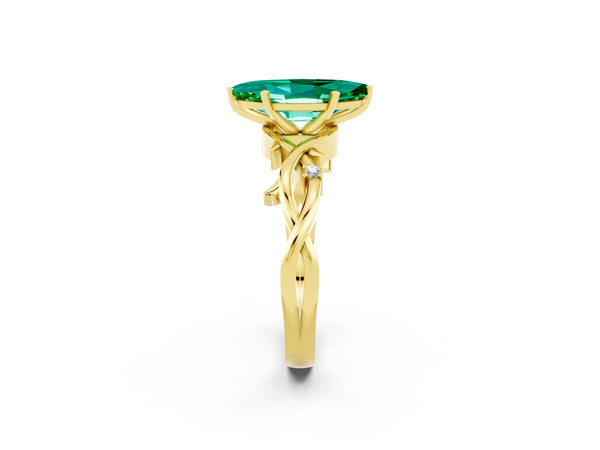 Yellow gold Marquise Cut Emerald Solitaire Ring with Twisted Band and Prong Setting