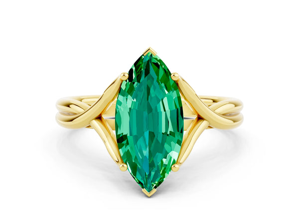Yellow gold Marquise Cut Emerald Solitaire Twist Band Prong Setting Ring