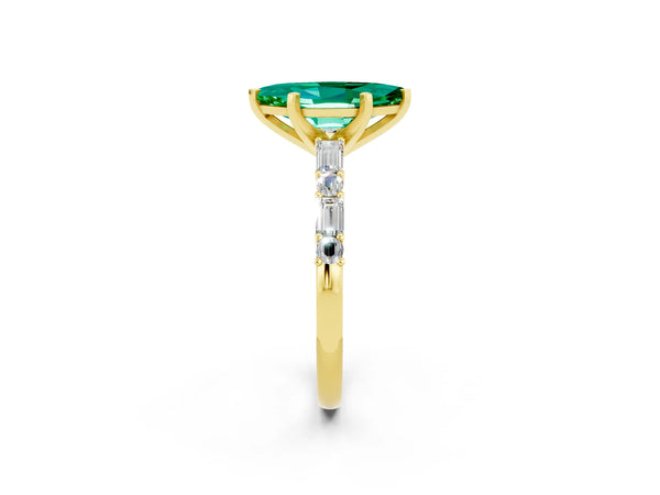 Yellow gold Marquise Cut Emerald Solitaire with Side Baguettes and Channel Set Band