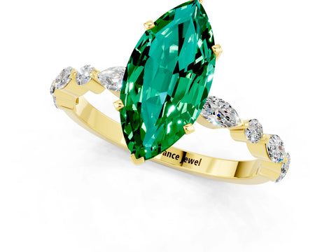 Yellow gold Marquise Cut Emerald Solitaire with Side Stones on a Pavé Band and Four-Prong Setting_1