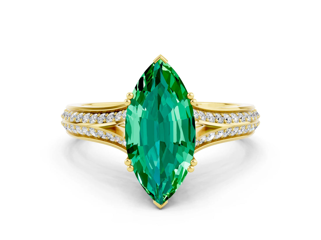 Yellow gold Marquise Cut Emerald Split Shank Engagement Ring with Pavé Band