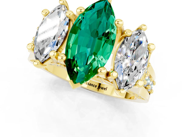 Yellow gold Marquise Cut Emerald Three-Stone Ring with Channel Set Band and Four-Prong Setting