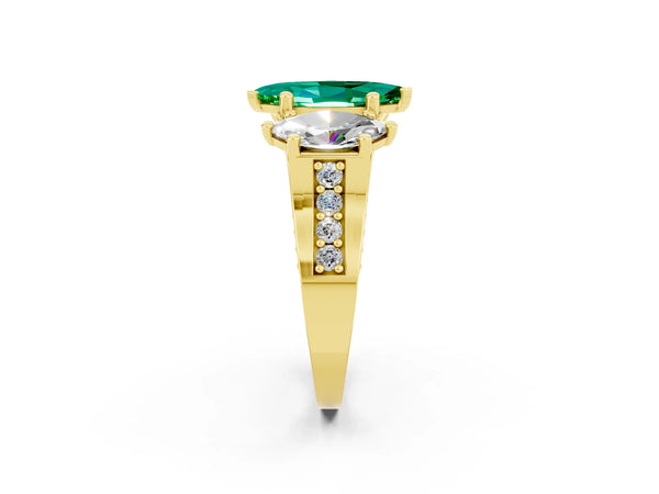 Yellow gold Marquise Cut Emerald Three-Stone Ring with Channel Set Band and Four-Prong Setting