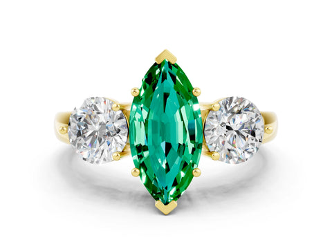 Yellow gold Marquise Cut Emerald Three-Stone Ring with Prong Setting and Classic Band