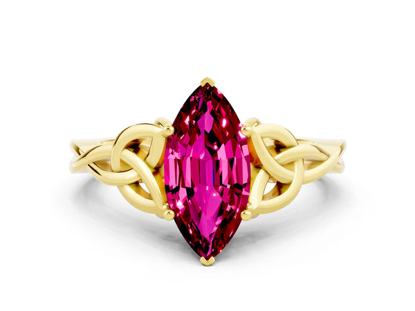 Yellow gold Marquise Cut Garnet Solitaire Engagement Ring with Celtic Knot Band and Four-Prong Setting