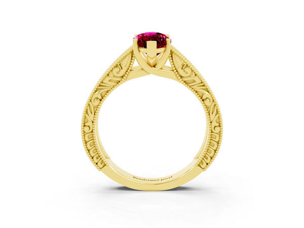 Yellow gold Marquise Cut Garnet Solitaire Ring with Engraved Band and Four-Prong Setting
