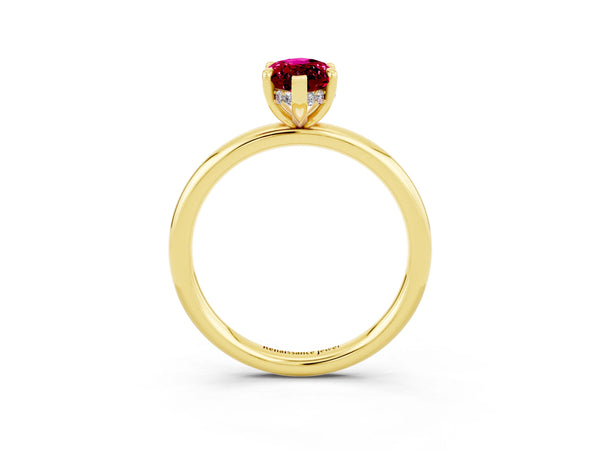 Yellow gold Marquise Cut Garnet Solitaire Ring with Thin Band and Four-Prong Setting