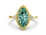 Yellow gold Marquise Cut Green Sapphire Halo Ring with Tapered Band and Four-Prong Setting