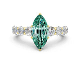 Yellow gold Marquise Cut Green Sapphire Prong Setting with Side Stones on a Pave Band