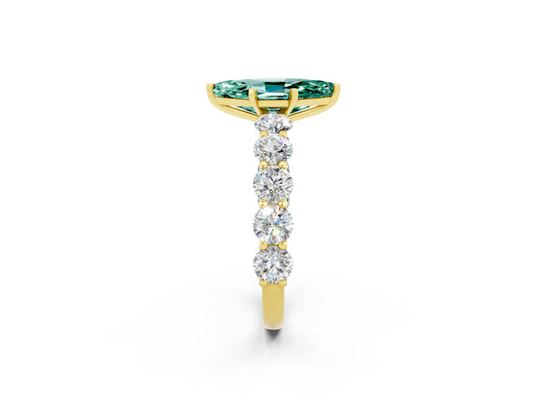 Yellow gold Marquise Cut Green Sapphire Prong Setting with Side Stones on a Pave Band