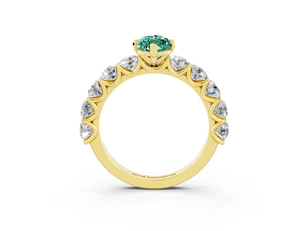 Yellow gold Marquise Cut Green Sapphire Prong Setting with Side Stones on a Pave Band