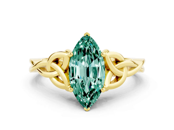 Yellow gold Marquise Cut Green Sapphire Solitaire Engagement Ring with Celtic Knot Band and Four-Prong Setting