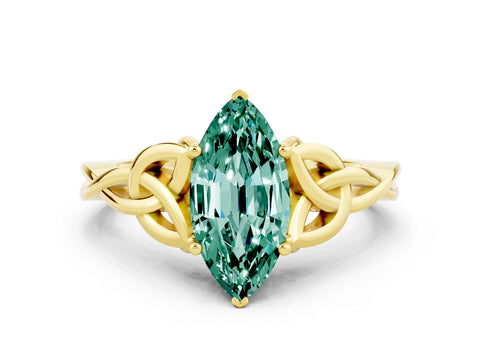 Yellow gold Marquise Cut Green Sapphire Solitaire Engagement Ring with Celtic Knot Band and Four-Prong Setting