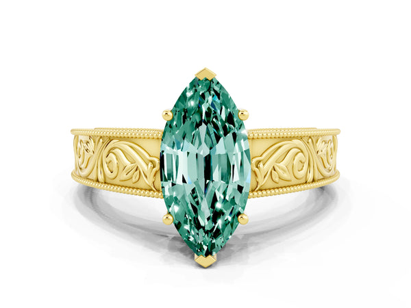 Yellow gold Marquise Cut Green Sapphire Solitaire Ring with Engraved Band and Four-Prong Setting