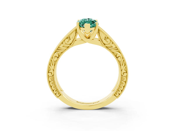 Yellow gold Marquise Cut Green Sapphire Solitaire Ring with Engraved Band and Four-Prong Setting