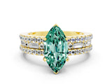 Yellow gold Marquise Cut Green Sapphire Solitaire Ring with Pavé and Channel Set Band