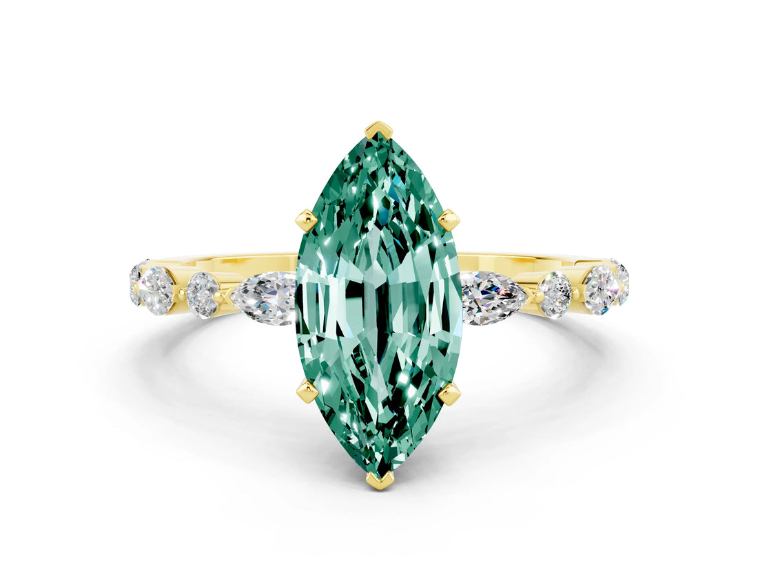 Yellow gold Marquise Cut Green Sapphire Solitaire with Side Stones on a Pavé Band and Four-Prong Setting