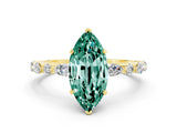 Yellow gold Marquise Cut Green Sapphire Solitaire with Side Stones on a Pavé Band and Four-Prong Setting